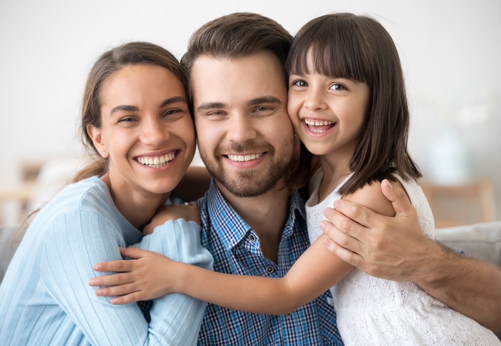 AFRA Dental Emergency Smiling Family